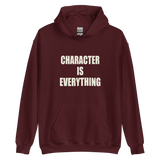 Character Is Everything Gildan 18500 hoodie in Maroon, front view with cream lettering